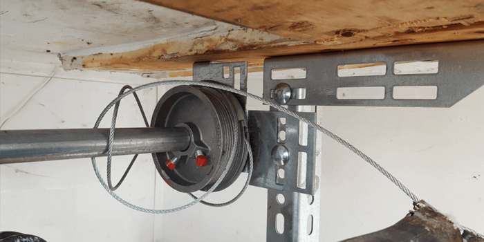 Chatelaine Village fix garage door cable